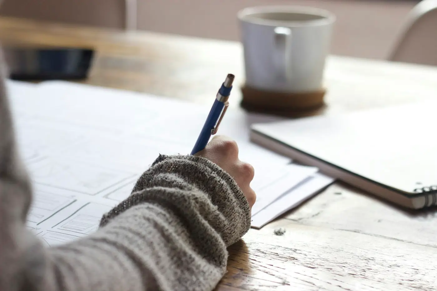 Writing a plan in a notebook