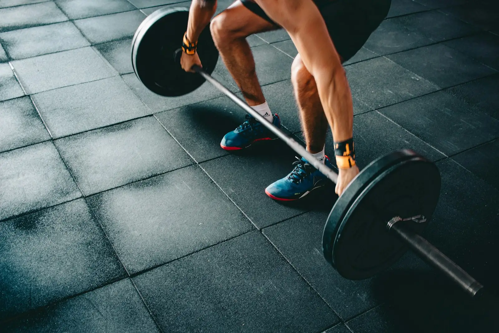 Lifter gripping a barbell